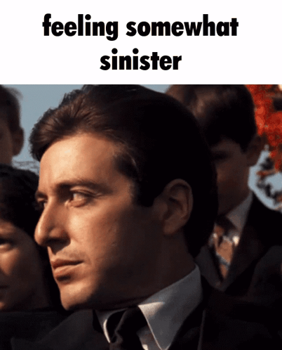 Man in Suit and Tie Feeling Somewhat Sinistrer
