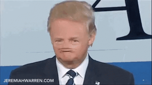 Man In Suit And Tie Funny Face Jeremiahwarren.com GIF