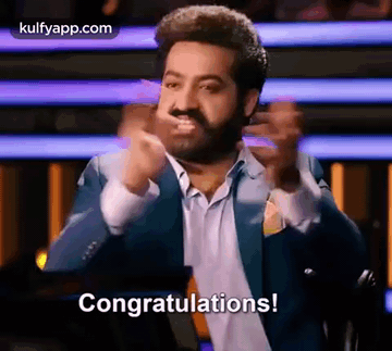 Man In Suit And Tie Giving Congratulations Speech GIF