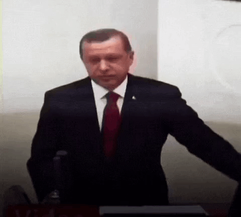 Man in Suit and Tie Giving Speech
