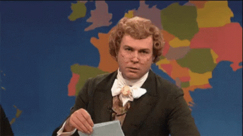 Man In Suit And Tie Holding Paper GIF