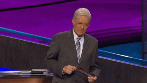 Man In Suit And Tie Holding Paper GIF