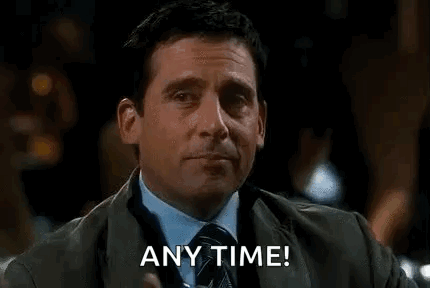 Man in Suit and Tie Holding Whiskey Says Any Time!