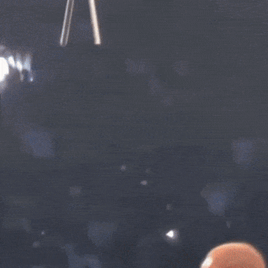Man in Suit and Tie in Boxing Ring