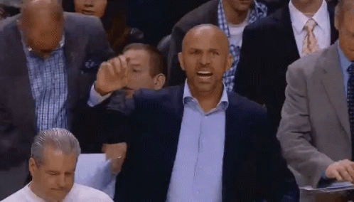 Man in Suit and Tie in Crowd