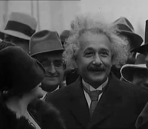 Man in Suit and Tie in Crowd