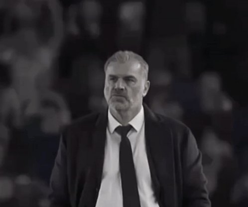 Man in Suit and Tie in Crowd