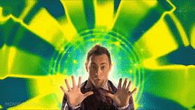 Man In Suit And Tie In Front Of Homeflix Background GIF