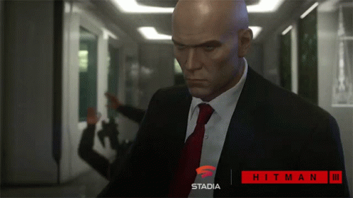 Man in Suit and Tie in Hallway Stadia