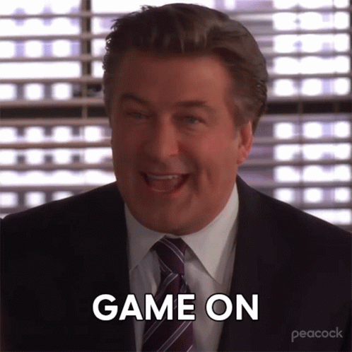 Man in Suit and Tie Laughing Game On