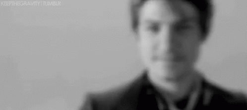 Man in Suit and Tie Looking at Camera