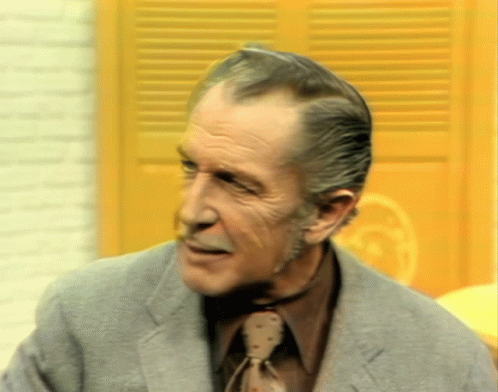 Man in Suit and Tie Looking at Camera