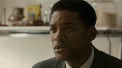 Man in Suit and Tie Looking at Camera Close Up