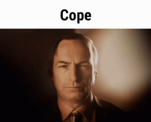 Man in Suit and Tie Looking at Camera Cope