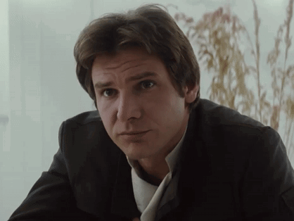 Man in Suit and Tie Looking at Camera