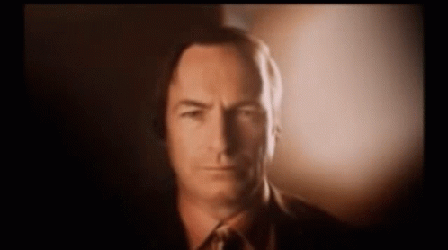 Man in Suit and Tie Looking at Camera