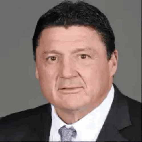 Man in Suit and Tie Looking at Camera
