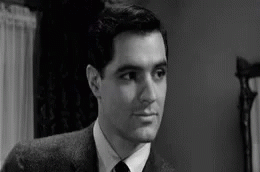 Man in Suit and Tie Looking at Camera
