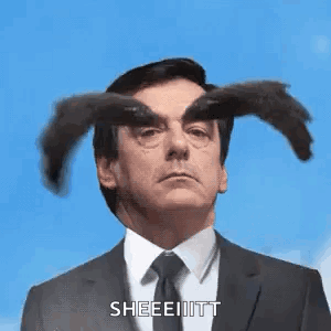 Man In Suit And Tie Looking At Something GIF