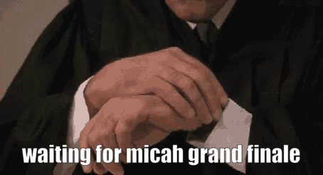 Man In Suit And Tie Looking At Watch Saying Waiting For Micah Grand Finale GIF