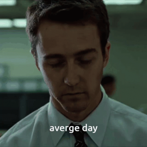 Man in Suit and Tie Looking Down Average Day