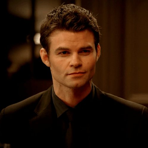 Man In Suit And Tie Looking Serious GIF