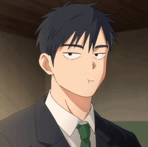 Man in Suit and Tie Making a Face