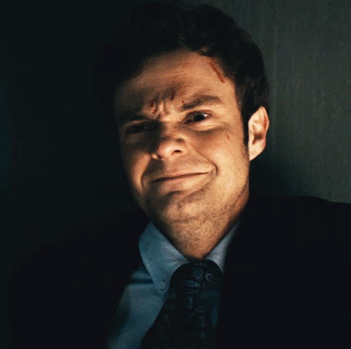 Man In Suit And Tie Making Face GIF