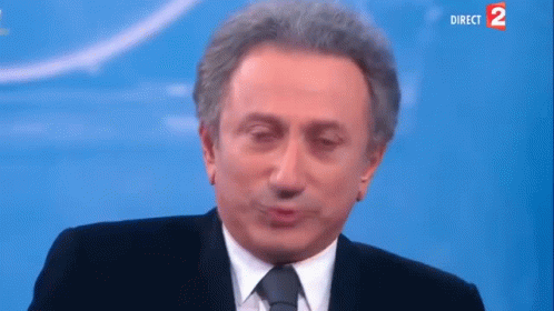 Man In Suit And Tie Making Face Direct 2 GIF