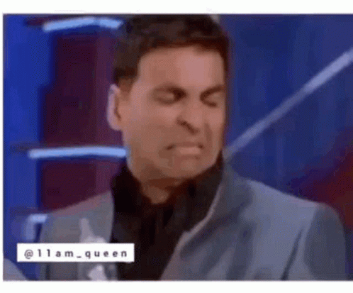 Man in Suit and Tie Making Face