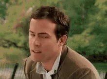Man in Suit and Tie Making Funny Face