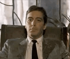 Man in Suit and Tie Making Funny Face