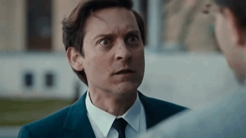 Man in Suit and Tie Making Funny Face