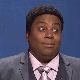 Man in Suit and Tie Making Funny Face