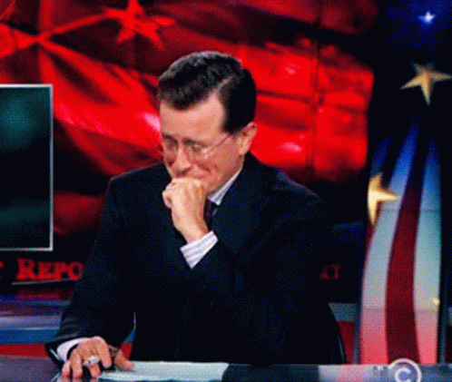 Man in Suit and Tie Making Funny Face at CBS Screen
