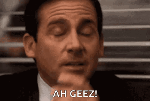 Man In Suit And Tie Making Funny Face At Window GIF