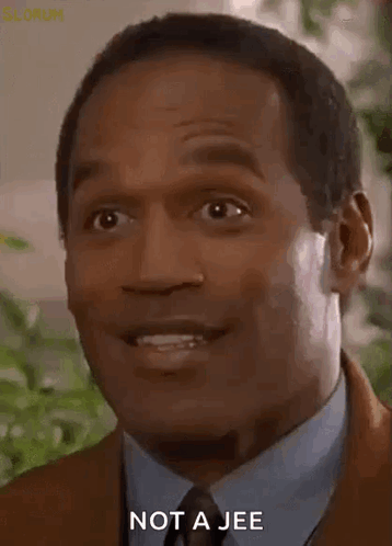 Man in Suit and Tie Making Funny Face Saying Not a Jee