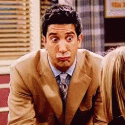 Man in Suit and Tie Making Funny Face