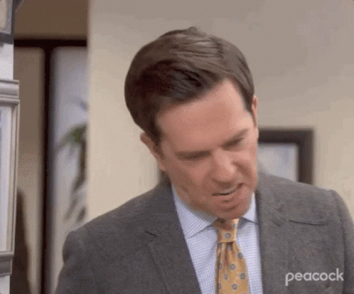 Man in Suit and Tie Making Funny Face