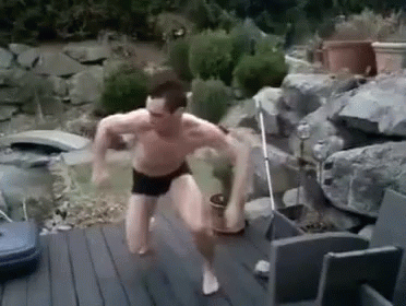 Man In Suit And Tie Next To People GIF