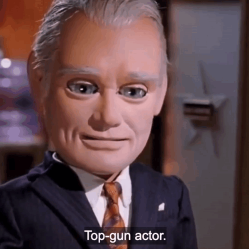 Man in Suit and Tie on Being Top Gun Actor