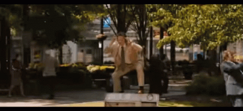 Man In Suit And Tie On Bench GIF