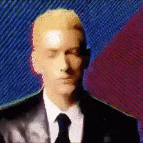 Man in Suit and Tie on Colorful Background