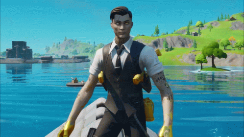 Man in Suit and Tie on Rock by Water