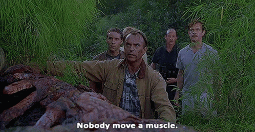 Man In Suit And Tie Outstretched Arms Crowd GIF