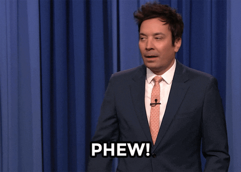 Man In Suit And Tie Phew GIF