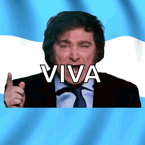 Man in Suit and Tie Pointing Viva