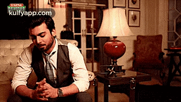 Man in Suit and Tie Praying