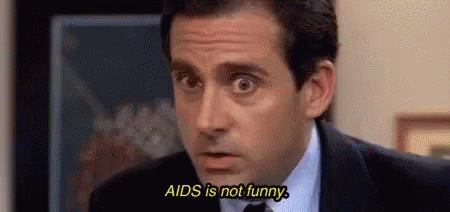 Man In Suit And Tie Saying AIDS Is Not Funny GIF