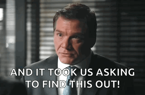 Man in Suit and Tie Saying And It Took Us Asking to Find This Out